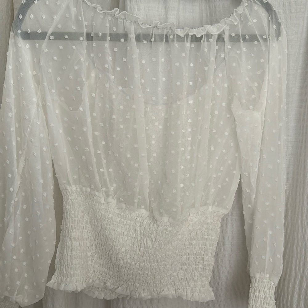 See through sheer top.  Great for an evening out